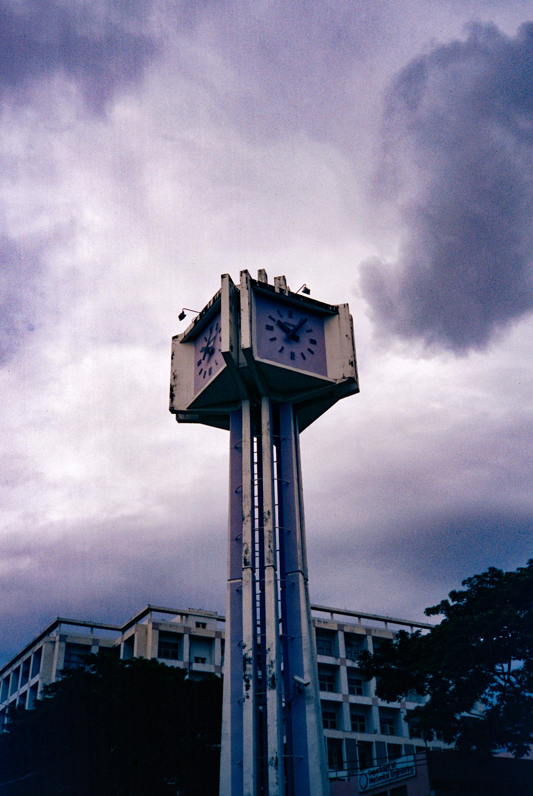 A clock tower under storm clouds
